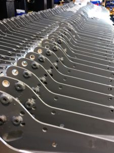 Rows of metal seat components