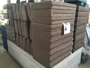 Starfish product - squabs /cushions stacked on pallet in factory