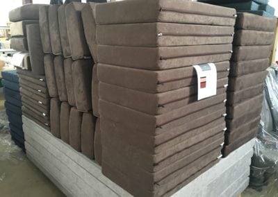 Starfish product - squabs /cushions stacked on pallet in factory