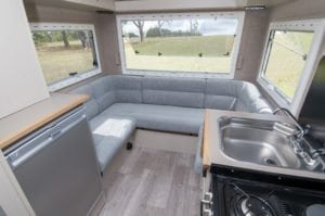 Finished motorhome interior with grey tonal upholstery