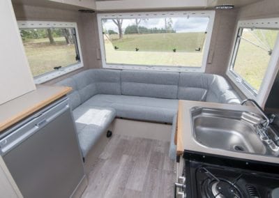 Finished motorhome interior with grey tonal upholstery