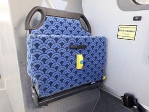 City Rider folding bus seat in closed position installed on bus