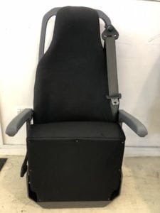 Front view of minivan seat retrimmed in black