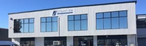 Front of Starfish building, white with Starfish sign