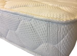 Quilted mattress close up