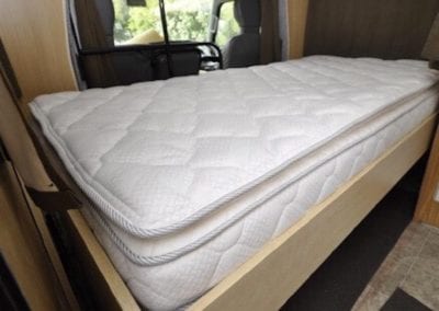 Bed with pillow top mattress in motorhome